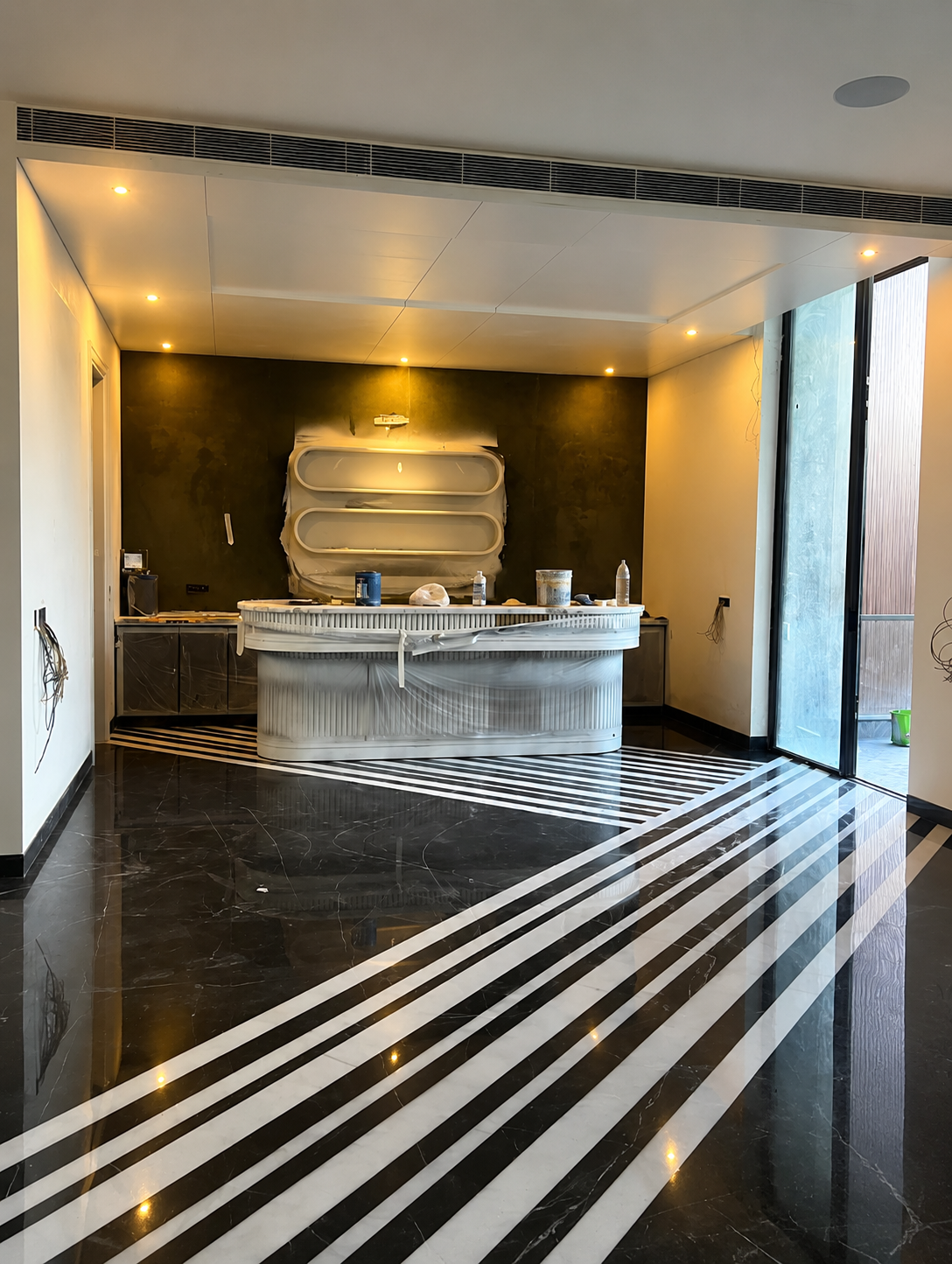Statuario Italian marble floor after diamond mirror finish restoration in Swasthya Vihar Delhi