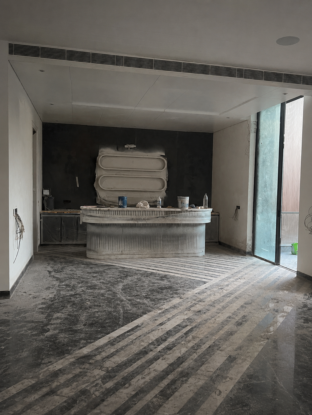 Statuario Italian marble floor before restoration showing dull scratches and lost shine in Delhi
