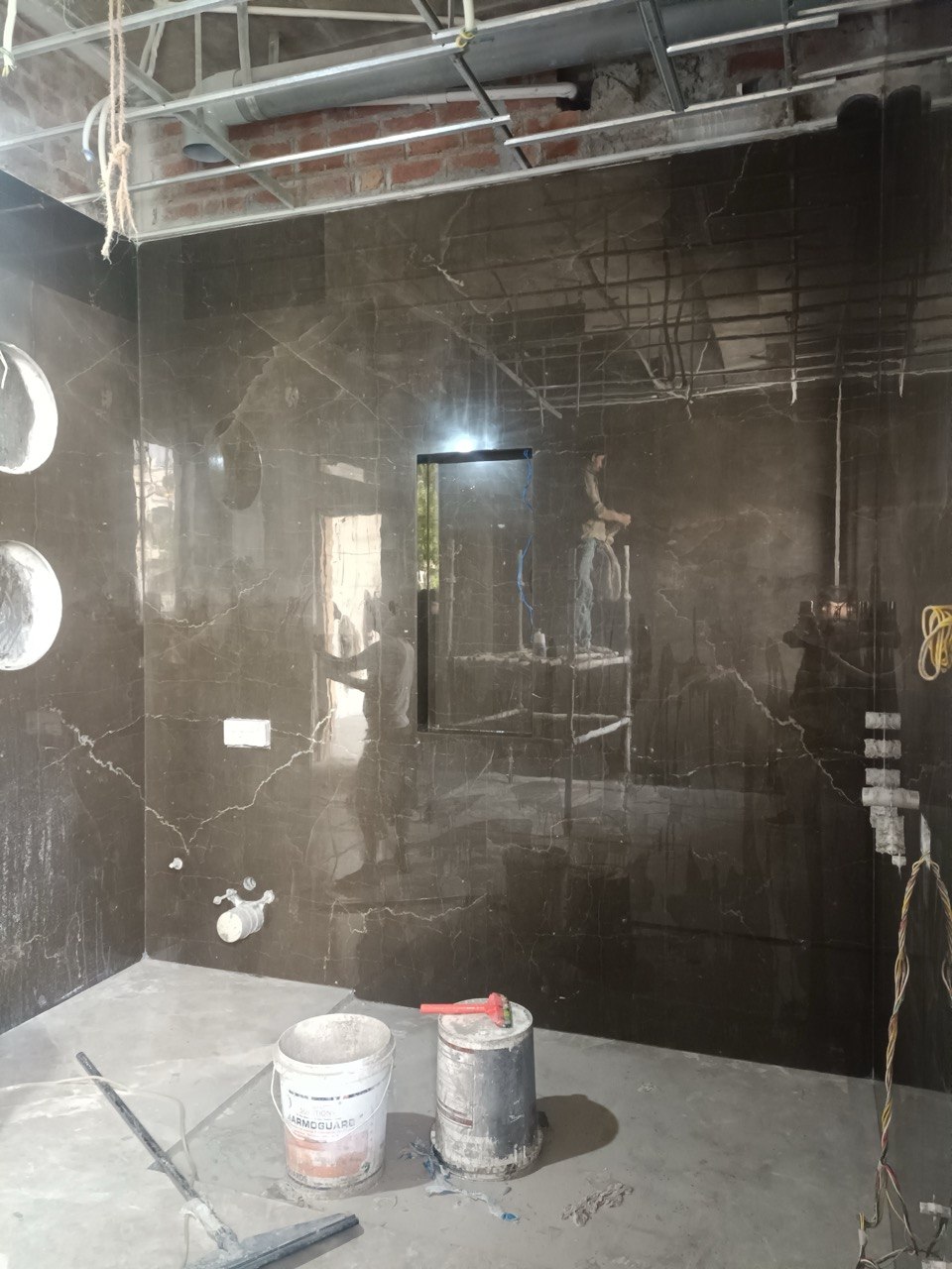 Laser-aligned marble slab installation in Surajmal Vihar Delhi