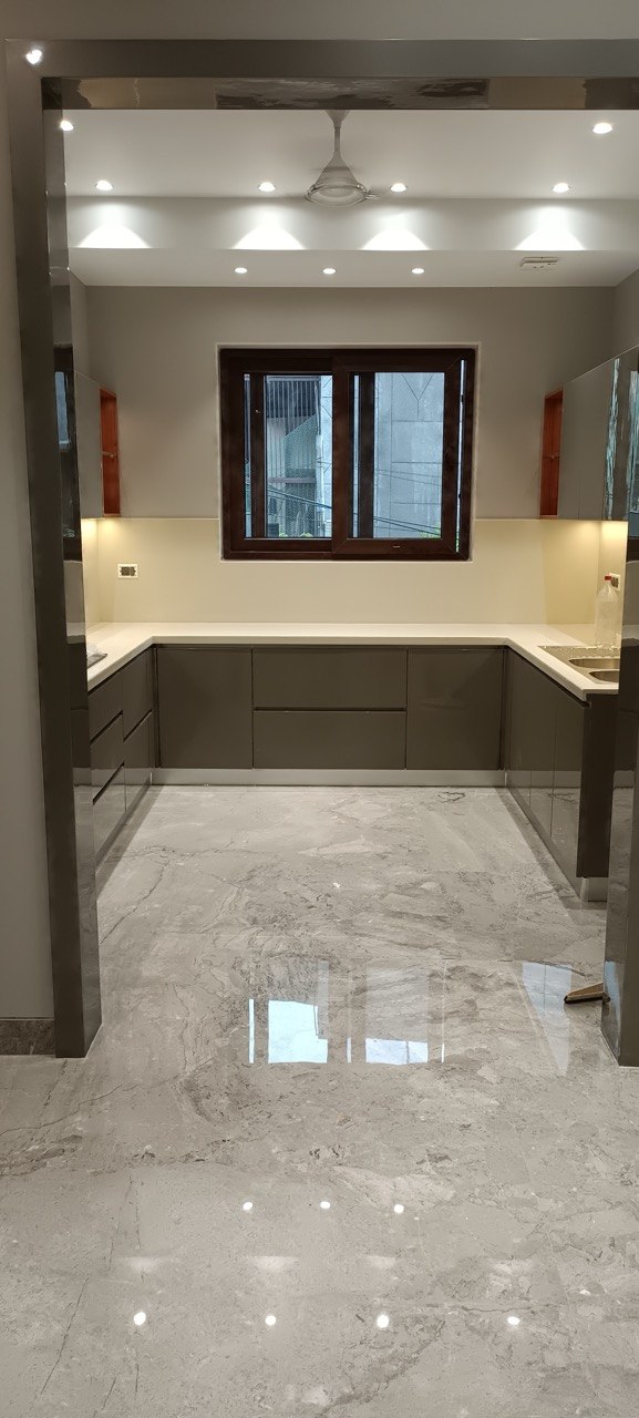 High-precision marble floor laying and epoxy grouting in Sector 50 Noida