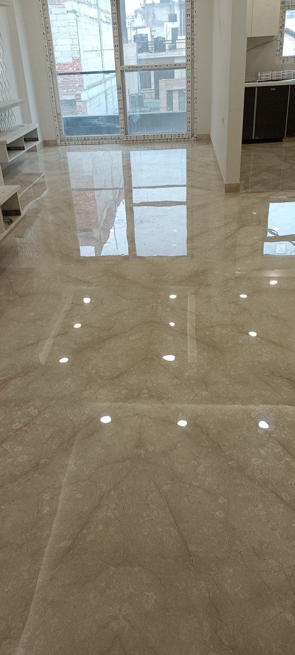 Old marble floor restoration project in DLF Phase 5, Gurugram